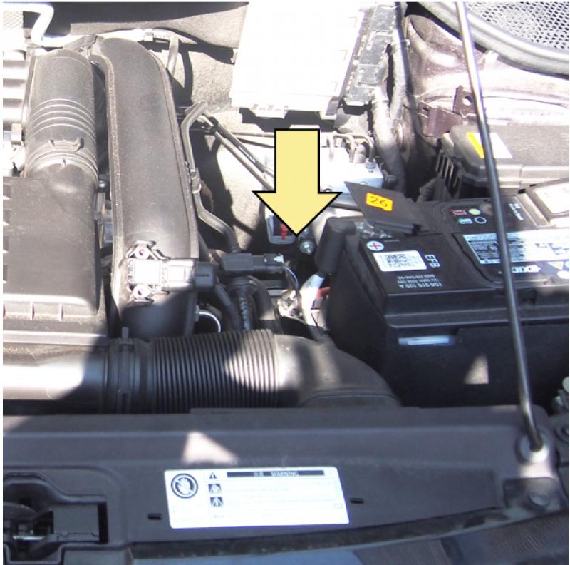 ギアオイル注入口はこの矢印の奥にあります。