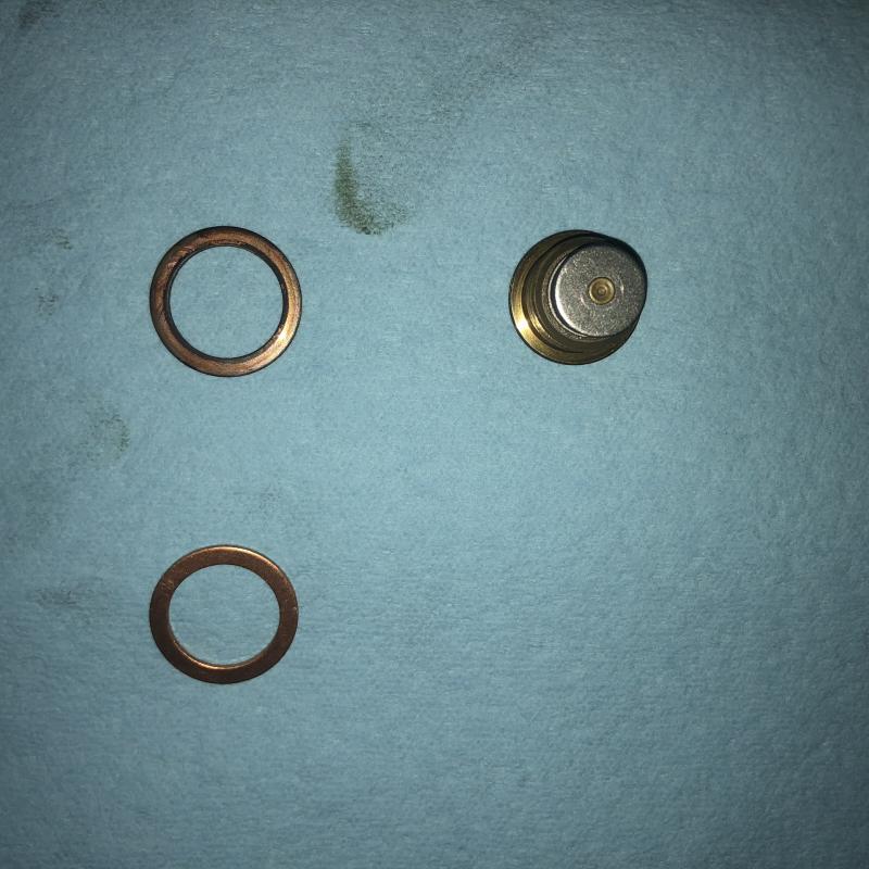 ドレンワッシャーを交換します。